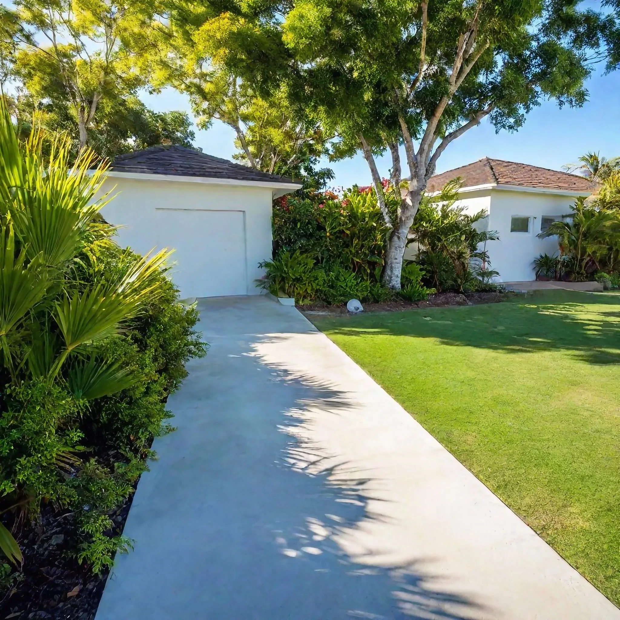 Concrete footpath along a property boundary