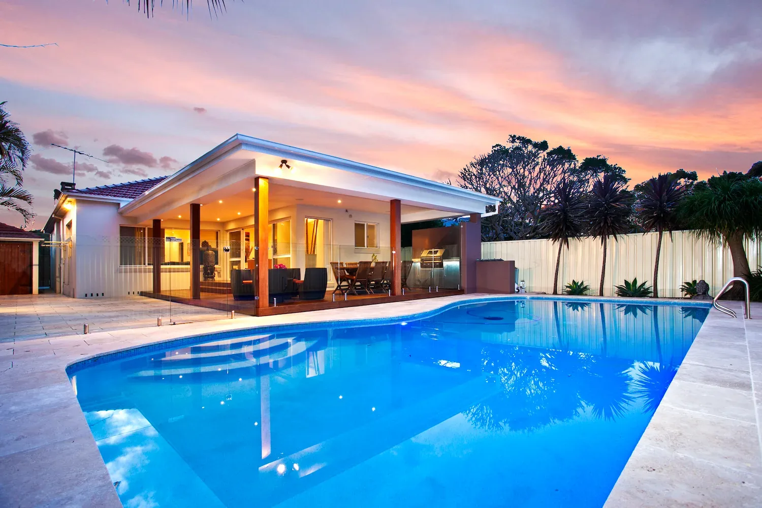 Concrete pool surround finished with non-slip texture